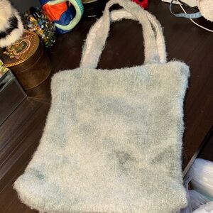 EUC FREE PEOPLE FAUX FUR TEAL CARRY ON 13x15 TOTE BAG. Beautiful m